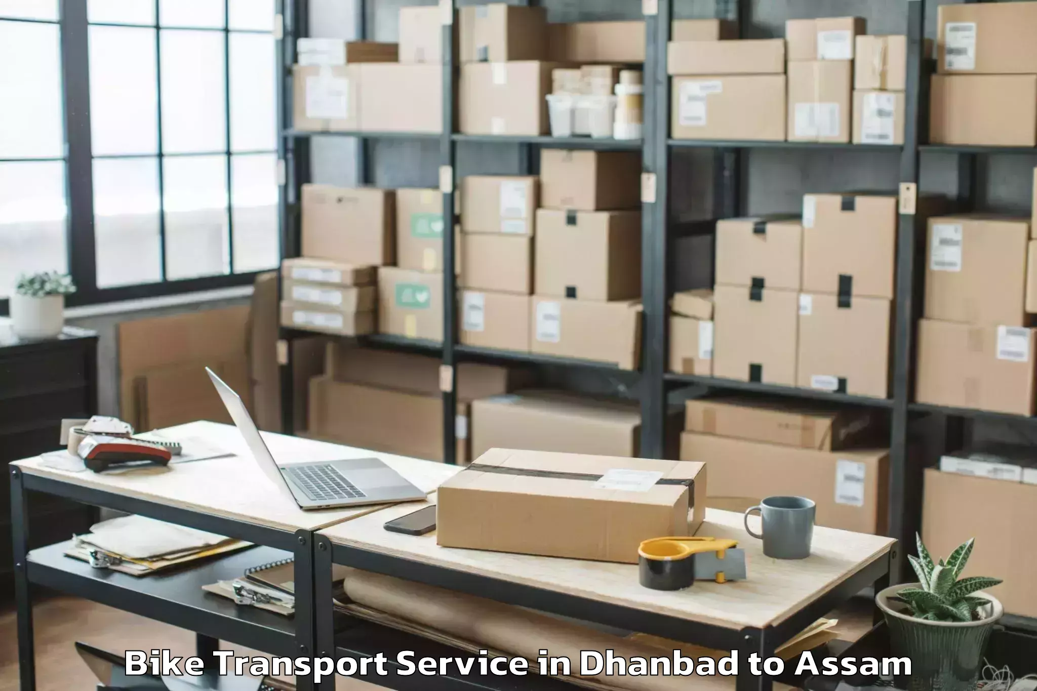 Expert Dhanbad to Jorhat Airport Jrh Bike Transport